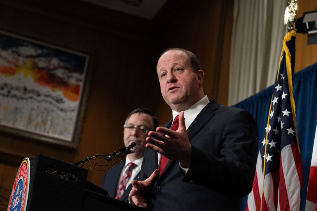 Colorado governor vetoes bill to restrict interchange fees
