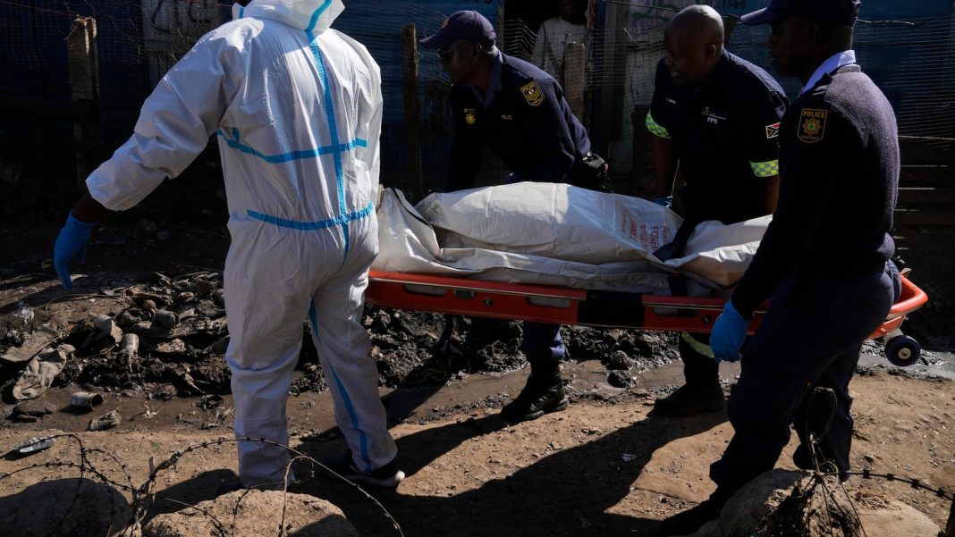 Mass shooting leaves 12 dead and at least 9 hurt in an impoverished South Africa community